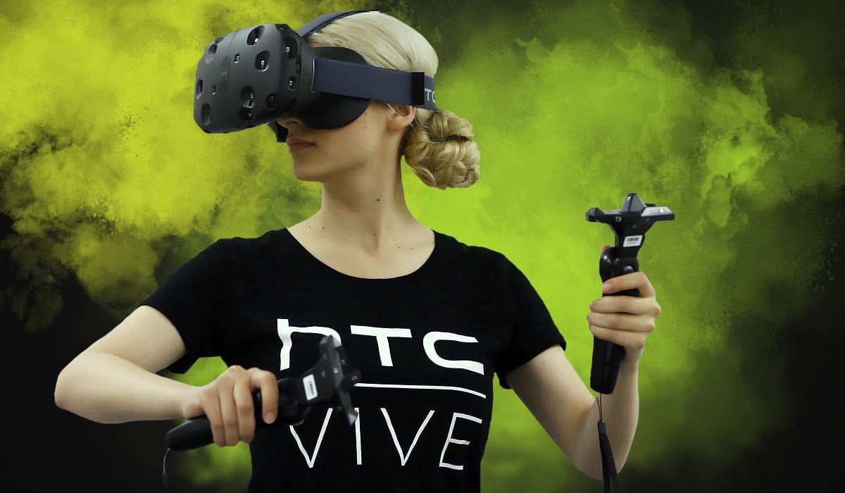 woman wearing virtual reality headset and holding VR controllers